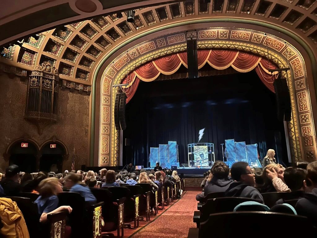 Students attending a field trip in the historic Florida Theatre